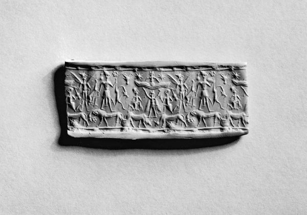 800px-mitannian_-_cylinder_seal_with_a_row_of_human_figures_above_animals_-_walters_42685